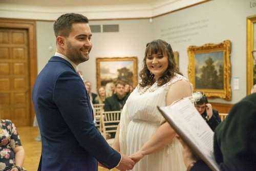 Photograph of Toby & Elizabeth Whittington getting married in Norwich